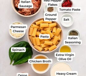 creamy italian sausage pasta with spinach, Ingredients for a Creamy Pasta dish are arranged on a white surface each labeled Italian sausage spinach red pepper flakes tomato paste parmesan cheese pasta and more perfect for making Italian Sausage Pasta at home