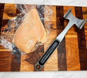parmesan chicken sandwich, Boneless chicken breast on a wooden cutting board ready for Italian cooking