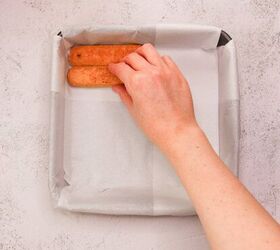 tiramisu, Golden ladyfingers being placed in a baking dish perfect for authentic tiramisu recipes