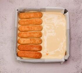 tiramisu, Golden Italian ladyfingers soaking in custard for tiramisu dessert