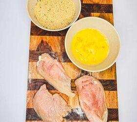 chicken alfredo bread boat, Breadcrumb crumbs and beaten eggs for Italian chicken recipes on a wooden board