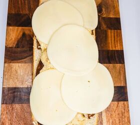 chicken alfredo bread boat, Slices of Italian cheese atop bread for Italian cooking ideas and recipes showcasing authentic Italian cheese and bread pairing