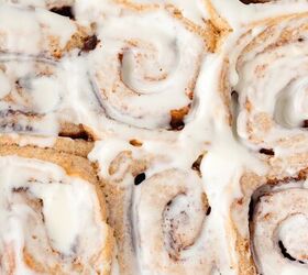 cinnamon rolls with fresh milled flour, Close up of cinnamon rolls with creamy white icing and golden swirled layers