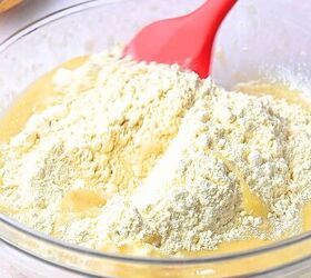 easy banana raspberry muffins with cake mix only 5 ingredients, Stirring in a full box of cake mix into the banana mixture creating muffin batter