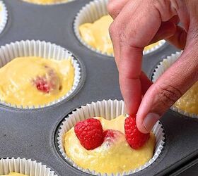 easy banana raspberry muffins with cake mix only 5 ingredients, Topping each muffin with a few fresh raspberries for a fruity finish