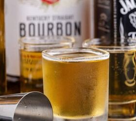 raspberry mousse, 3 Wise Men Shot in Shot Glasses on a Tray with Liquor Bottles Close Up