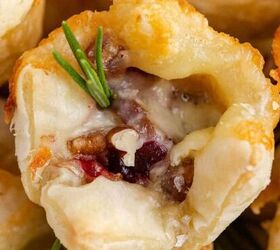 cheesy chicken casserole, Close Up Cranberry Brie Bites Stacked on a Plate and Garnished with Rosemary Sprigs