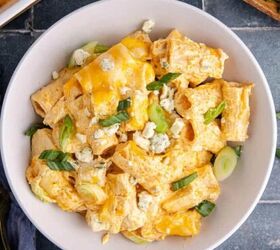 cheesy chicken casserole, Buffalo Chicken Casserole from above in a bowl with blue cheese crumbles and green onions