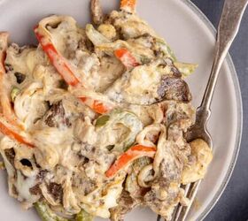 cheesy chicken casserole, Philly Cheesesteak Casserole on a plate with a fork