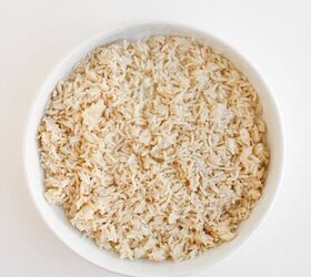 the best bang bang shrimp bowl ready in 30 minutes, Cooked rice in a bowl ready for a bang bang shrimp bowl