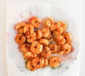 the best bang bang shrimp bowl ready in 30 minutes, Crispy fried shrimp draining on paper towels