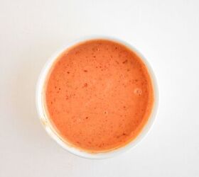 the best bang bang shrimp bowl ready in 30 minutes, Creamy bang bang sauce mixed in a small bowl