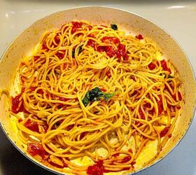 pasta al pomodoro, Vinegar pasta with tomatoes and spinach classic Italian Cooking Ideas Recipes in a white pot