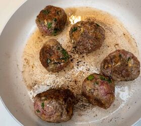 spaghetti and meatballs, Savory Italian meatballs cooking in a skillet seasoned with herbs and spices for authentic Italian cooking ideas
