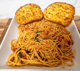 pasta al pomodoro, Creamy baked chicken cutlets with spaghetti in tomato sauce on plate