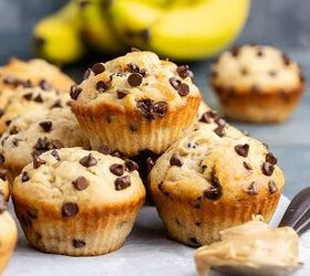 peanut butter banana muffins, Peanut Butter Banana Muffins piled on a parchment paper