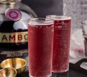 shamrock sour, Grape Ape Shots in Tall Shot Glasses on a Tray with Chambord in Background
