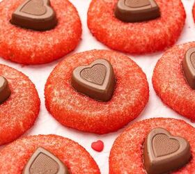 easy valentine s day heart cookies eggless sugar cookies recipe, Homemade heart shaped sugar cookies coated in red sanding sugar and topped with chocolate hearts on a countertop