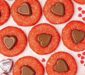 easy valentine s day heart cookies eggless sugar cookies recipe, Festive homemade sugar cookies in heart shapes topped with Hershey s chocolate hearts on a counter