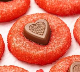 how to make chocolate dipped rice krispie treats, Heart shaped sugar cookies topped with Hershey s chocolates on a kitchen counter