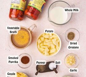 easy creamy roasted red pepper gouda soup recipe, ngredients for creamy roasted red pepper Gouda soup including jarred roasted red bell peppers potato Gouda cheese onion garlic and herbs