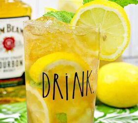 bourbon mint iced tea, a bourbon iced tea cocktail with lemon and mint in a clear glass that has drink written on it