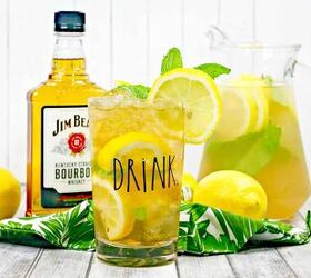 bourbon mint iced tea, a sweet tea cocktail with lemon and mint with a bottle of Jim Beam and a pitcher in the background