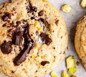 pistachio chocolate chip cookies, Pistachio Chocolate Chip Cookies on parchment paper up close