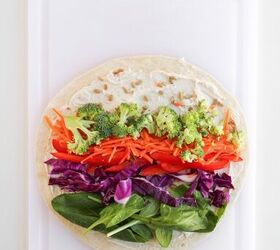 rainbow veggie pinwheels recipe easy and colorful, Fresh vegetables layered on a tortilla with creamy filling for veggie pinwheels