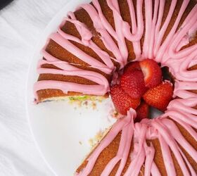 easter bundt cake recipe for spring celebrations, Sliced Easter bundt cake with pink icing and fresh strawberries on a white plate