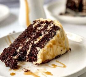 easter bundt cake recipe for spring celebrations, Slice of chocolate cake layered with creamy filling on a white plate drizzled with caramel sauce with additional slices blurred in the background