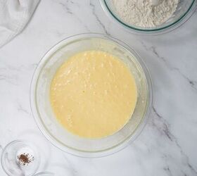 easter bundt cake recipe for spring celebrations, Wet ingredients mixed together in a glass bowl for Easter bundt cake batter