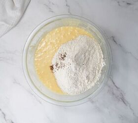 easter bundt cake recipe for spring celebrations, Flour and spices added to the wet ingredients for Easter bundt cake batter