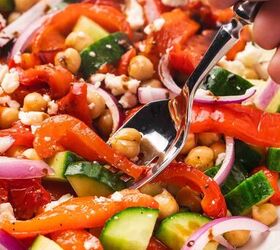 easy roasted red bell pepper and chickpea salad recipe, Mediterranean chickpea salad with roasted red peppers cucumber and feta on a platter