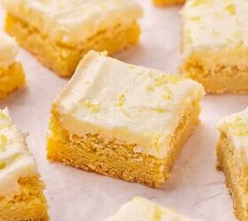 easy soft lemon sugar cookie bars best dessert for spring, Close up of a soft lemon sugar cookie bar with creamy lemon buttercream frosting and fresh lemon zest on top