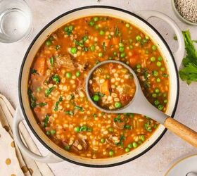 the best beef and barley stew comforting one pot recipe, Rich beef and barley stew cooking in a large pot on the stovetop