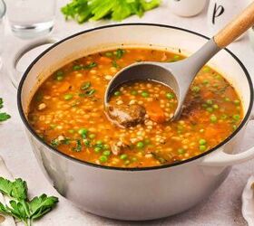 the best beef and barley stew comforting one pot recipe, Homemade beef and barley stew simmering in a Dutch oven