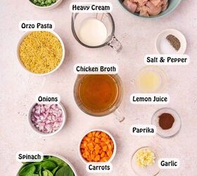 creamy lemon chicken orzo pasta easy one pan dinner recipe, Creamy lemon chicken orzo pasta with carrots and peas cooked in a one pan skillet served with fresh lemon slices and crusty bread