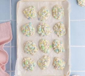 crockpot easter candy clusters, Crockpot Easter Candy Clusters from above of them on a baking pan with parchment paper
