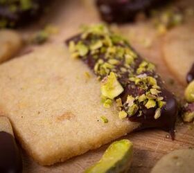 pistachio cookies dipped in dark chocolate, Chocolate dipped pistachio cookies garnished with pistachio s