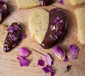 pistachio cookies dipped in dark chocolate, Chocolate dipped pistachio cookies garnished with crushed rose petals