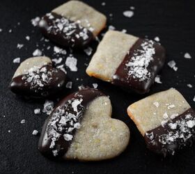 pistachio cookies dipped in dark chocolate, chocolate dipped pistachio cookies with flaky sea salt garnish
