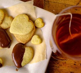 pistachio cookies dipped in dark chocolate, hot tea served with pistachio cookies