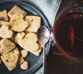 pistachio cookies dipped in dark chocolate, Pistachio cookies on platter with mug of tea