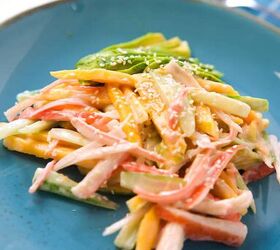 quick and easy spicy crab salad in just 15 minutes, Side view of spicy crab salad with imitation crab mango cucumber and sesame seeds