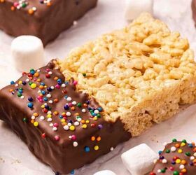 easy 4 ingredient peeps s mores dip for easter, Square Rice Krispie treats dipped in chocolate decorated with colorful rainbow sprinkles