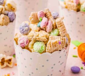 easy easter bunny bait snack mix no bake recipe, Close up of mini paper cups filled with Bunny Bait showing Chex popcorn M Ms sprinkles and coconut