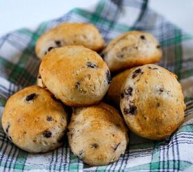 blueberry biscuits easy buttermilk blueberry biscuit recipe, Blueberry Biscuits on a plaid cloth stacked in a pile