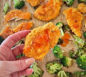 cornflake chicken strips with sweet chili honey and broccoli, Hand holding cornflake chicken strip
