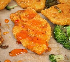 cornflake chicken strips with sweet chili honey and broccoli, Close up of crunchy cornflake crust on baked chicken strip